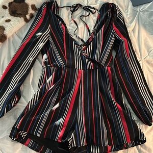Trixxi Clothing Co. Women’s Vertical Striped Long Sleeve Romper